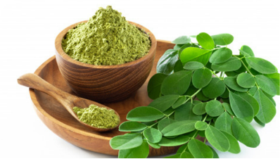 Premium Shuddha Space moringa powder, a natural superfood supplement in eco-friendly packaging.